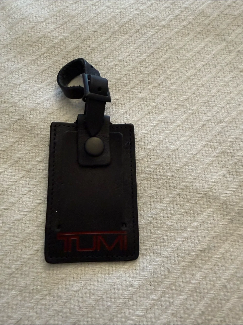 Tumi Black Leather Luggage Tag with Red Logo